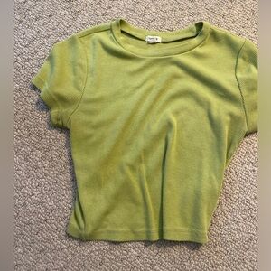Green t-shirt from garage